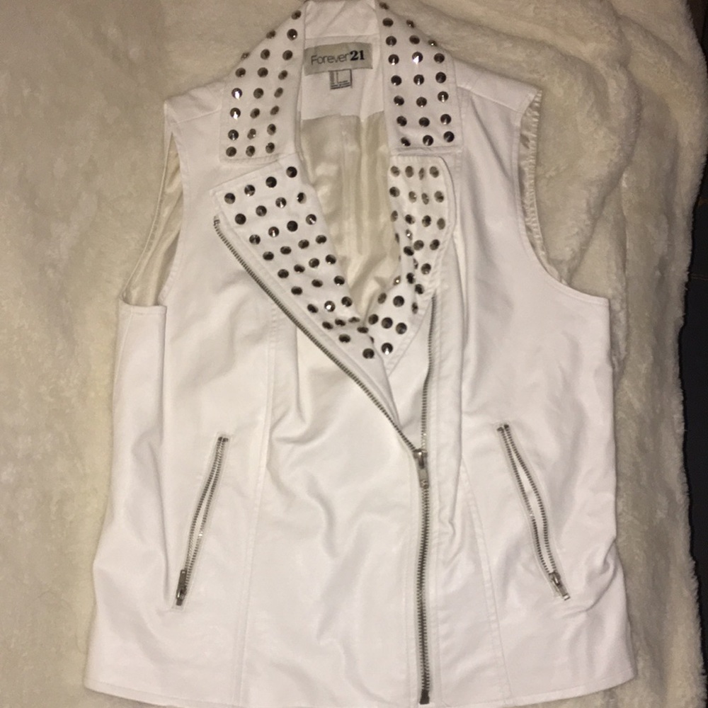 White studded "leather" vest.